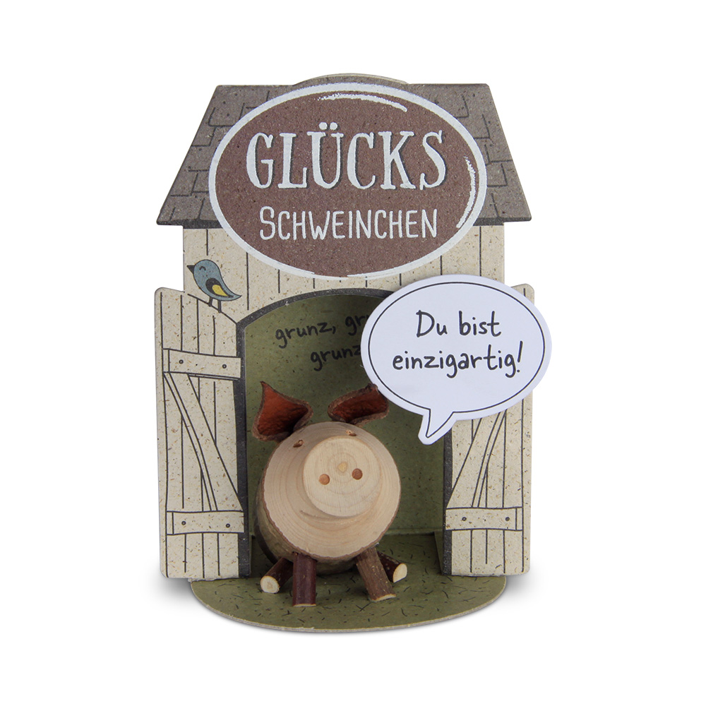 Glücksschweinchen sitzend: "Du bist einzigartig!"